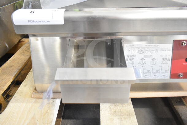 Brand new Avantco 177EG60C 60" electric countertop griddle, 208V, 3 phase, visible design schematics. Scratch and dent condition.
