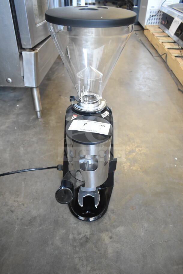 Brand new Estella 236ECEG26 espresso grinder with minor scratches. 120V, 1-phase. Features clear bean hopper and stainless steel accents.