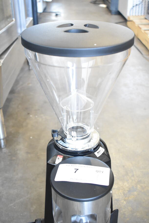 Brand new Estella 236ECEG26 espresso grinder, 120V, 1 phase. Visible scratch and dent, includes labels and settings dial.
