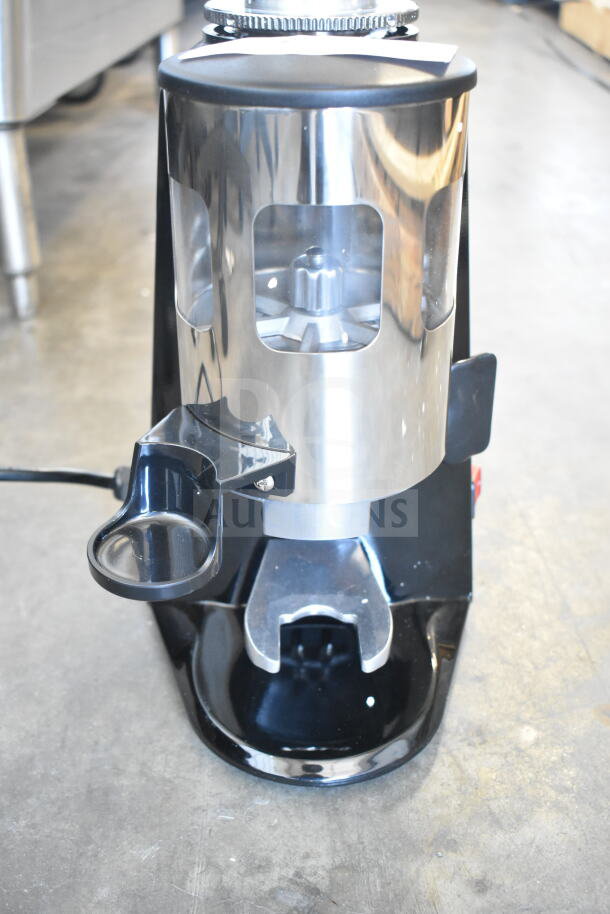 Brand new Estella 236ECEG26 espresso grinder with minor scratches. 120 volts, 1 phase. Sleek design, shiny finish.