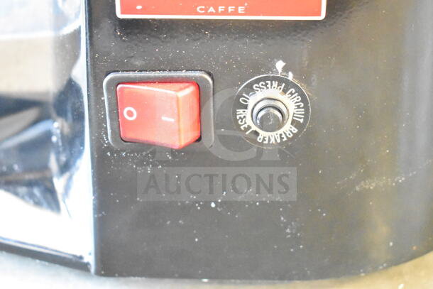 BRAND NEW Estella 236ECEG26 Espresso Grinder, scratch and dent condition, 120V, 1 phase, visible power switch and reset button.
