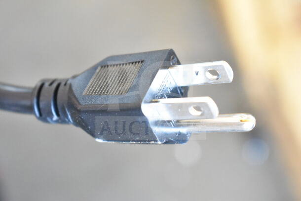 Close-up of a power plug for a brand new Estella 236ECEG26 espresso grinder, 120 volts, 1 phase.