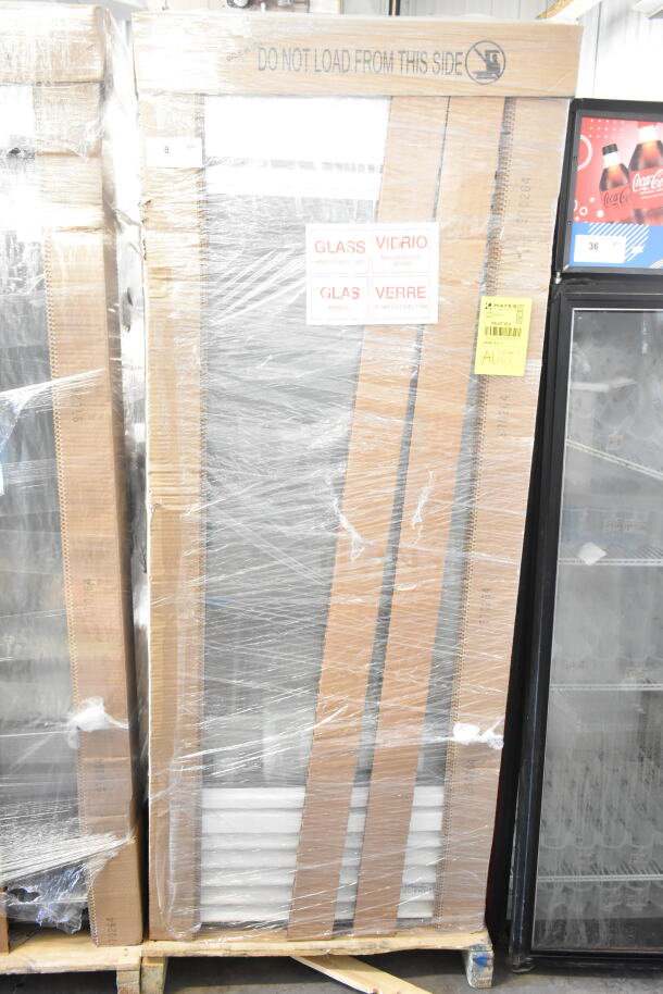 Brand new True TSCI-600R-G-PH commercial cooler, still in packaging, 115 volts, single door, scratch and dent condition.