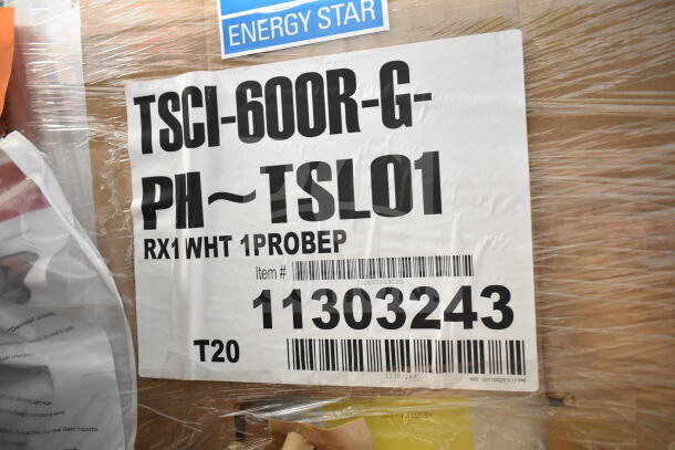 Brand new True TSCI-600R-G-PH cooler, single door, 115 volts, 1 phase. Features scratch and dent. Item label visible.