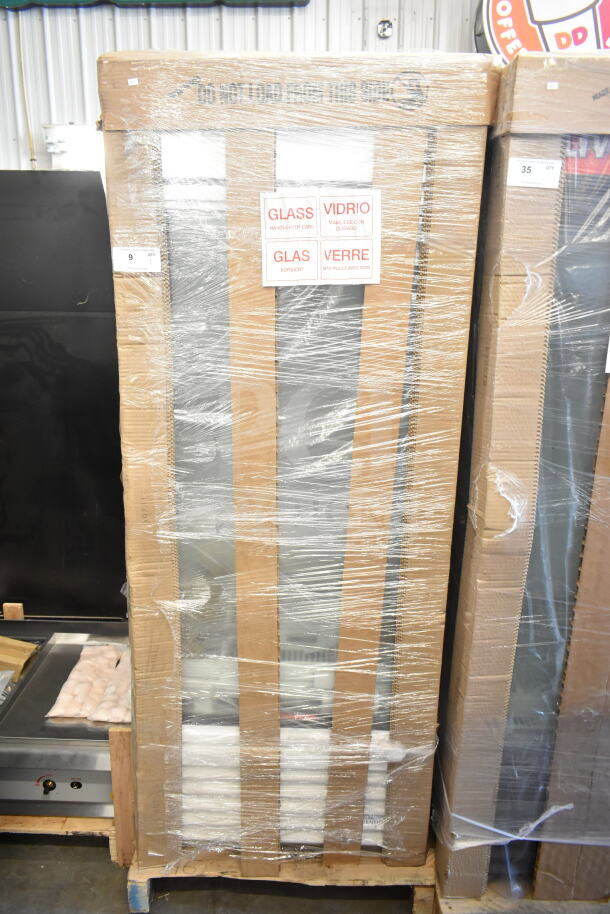 Brand new True TSCI-600R-G-PH commercial cooler, single door, 115V, 1 phase. Packaged with cardboard, labeled "glass."