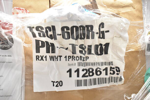 BRAND NEW SCRATCH AND DENT! 2026 True TSCI-600R-G-PH Commercial Cooler, 115V, with packaging label showing model and item number.