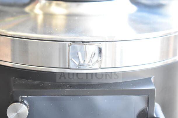 2025 Mahlkonig E80W GBS white espresso grinder, stainless steel accents, grind-by-sync feature, minor scratch visible.