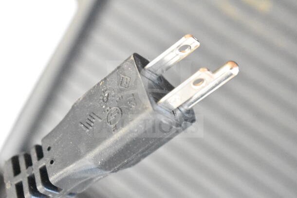 Close-up of a power plug compatible with the 2025 Nuova Simonelli OSCAR II AD Black Espresso Machine, 110-120V, 1 Phase.