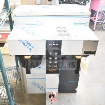 Brand new 2025 Fetco CBS-1252 Plus Series twin automatic coffee brewer, plastic brew basket, 208/240V, minor scratches.
