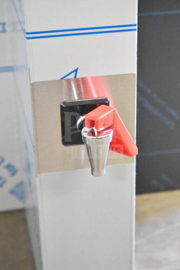 Brand new Fetco CBS-1252 Plus Series twin coffee brewer spout with red handle, 208/240 volts, scratch and dent.