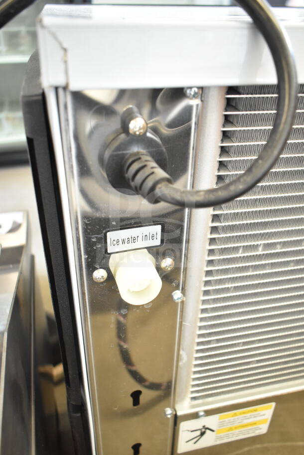 Brand new Avantco 194MCF430A ice machine, 397 lb capacity, ice water inlet shown, minor scratch and dent. 115V, 1 phase.