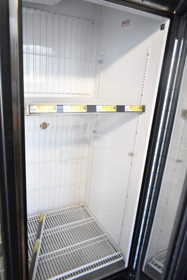 2016 True GDM-72F-HC 3-door freezer merchandiser, 115/208-230V, 1 phase, tested and working. Clean interior with shelving.