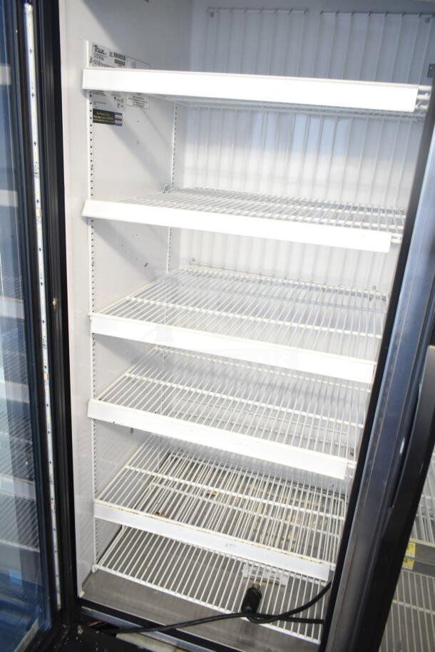 2016 True GDM-72F-HC Commercial 3 Door Freezer, tested and working, 115/208-230V, 1 Phase, with adjustable wire shelves.