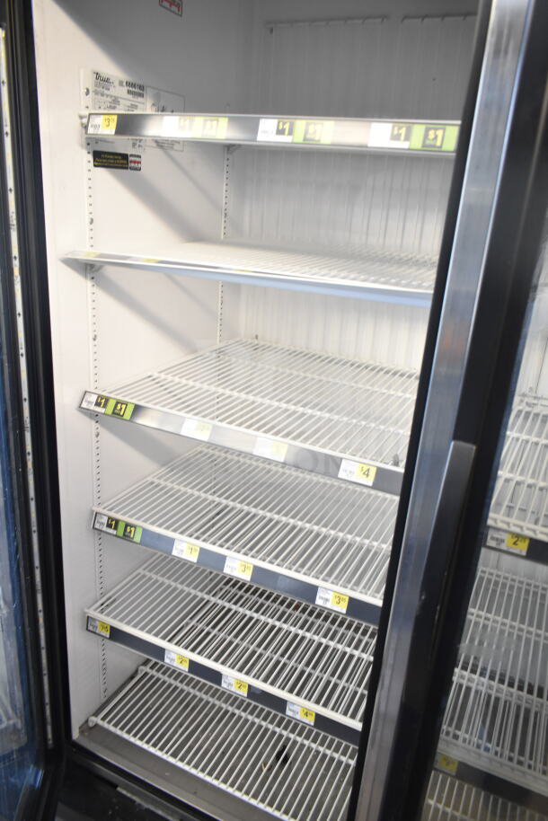 2016 True GDM-72F-HC commercial 3-door freezer with adjustable shelves, tested and working, 115/208-230V, 1 phase.