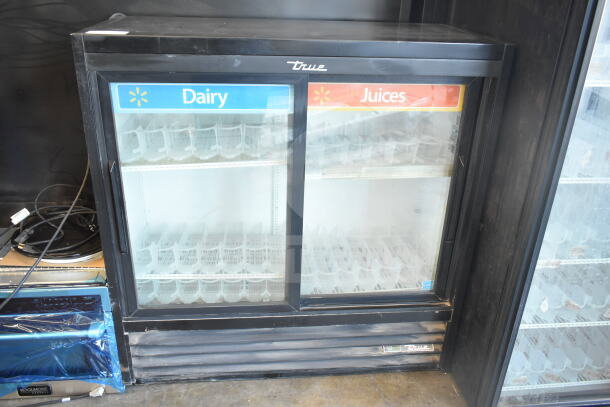 2019 True GDM-41SL-48-HC-LD commercial cooler, 2 glass doors, "Dairy" and "Juices" labels, good condition, 115V, 1 phase.