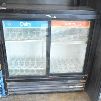 2019 True GDM-41SL-48-HC-LD commercial cooler, 2 glass doors, "Dairy" and "Juices" labels, good condition, 115V, 1 phase.