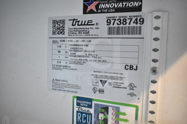 2019 True GDM-41SL-48-HC-LD 2 Door Cooler label showing model, serial number 9738749, voltage, and refrigerant info.