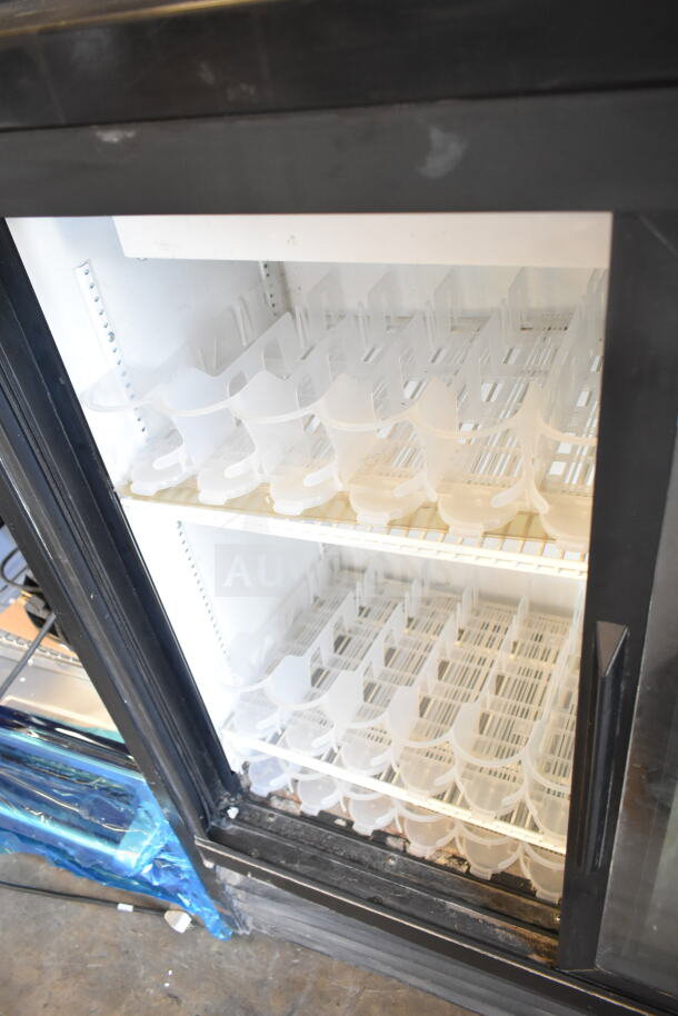 2019 True GDM-41SL-48-HC-LD commercial cooler, 2 door, shelves with drink holders, 115V, 1 Phase, used condition.