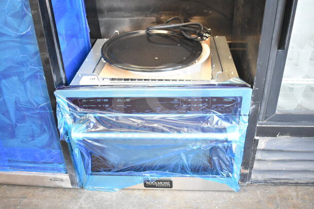 Brand new KoolMore Reserve 24" microwave convection oven, 3-in-1 combo, scratch and dent, blue protective film, model details visible.