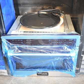 Brand new KoolMore Reserve 24" microwave convection oven, 3-in-1 combo, scratch and dent, blue protective film, model details visible.