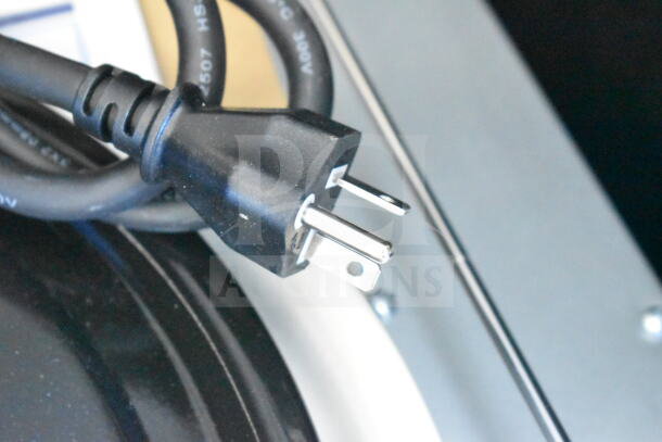 Close-up of a power cord plug for a 2026 KoolMore Reserve 24 in. Built-In Microwave Convection Oven with Air Fry.