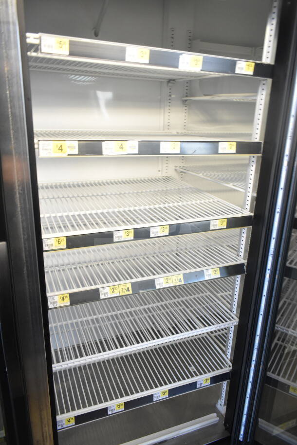 2016 True GDM-72-HC commercial 3-door reach-in cooler, tested and working, features adjustable shelves, 115V, 1 phase.