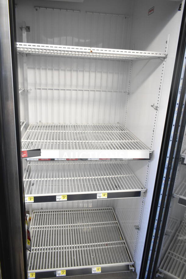 2016 True GDM-72F-HC 3-door reach-in freezer, commercial-grade, shelving inside, tested and working, 115/208-230 volts.