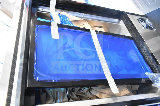 KoolMore CDC-49-SS display fridge, brand new, scratch and dent. Blue protective cover, ready for setup.