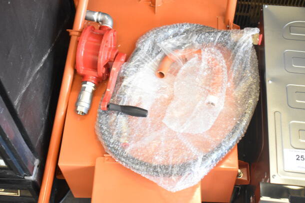 Brand new Fryclone 259DISPL00 100 lb. fryer oil disposal unit, red handle, wrapped in bubble wrap. Visible scratch and dent.