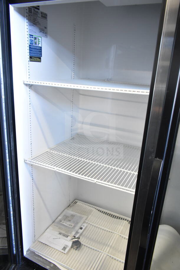 2016 True GDM-72-HC commercial 3-door cooler, white interior shelves, tested and working, 115V, 1 phase, clean condition.