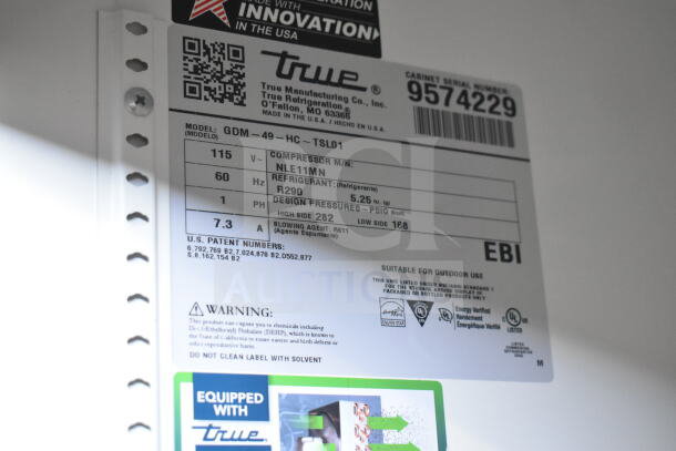 2016 True GDM-72-HC commercial cooler label, showing specs: 115V, 1 phase, R290 refrigerant. Serial number 9574229.
