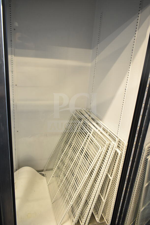 2018 True GDM-49-HC Commercial Cooler, 2-door, white wire racks, tested and working, 115 volts, 1 phase.