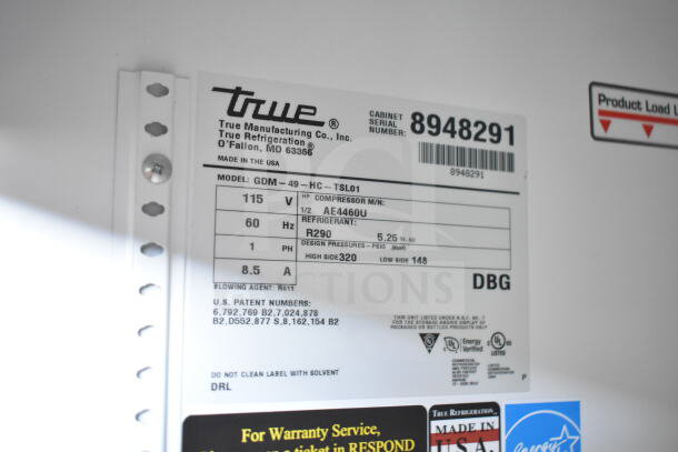 True GDM-49-HC commercial cooler label. 115V, 60Hz, 1 phase. Tested and working. Model, refrigerant, and serial details shown.