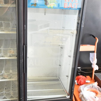 True GDM-12 commercial single door cooler merchandiser, 115 volts, 1 phase, used condition. Visible branding and glass door.