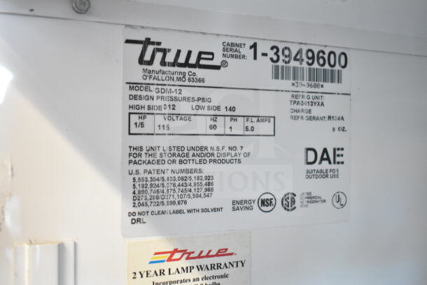 True GDM-12 cooler label, 115V, 1 phase, NSF certified, 2-year lamp warranty, for storage/display of packaged products.