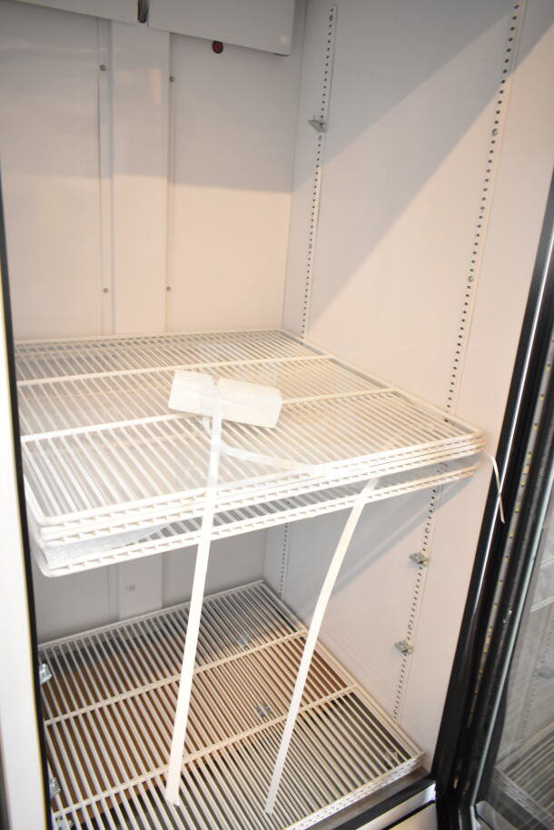 2026 True TSCI-600R-G-PH commercial cooler, single glass door, adjustable shelves, 115 volts, excellent condition.