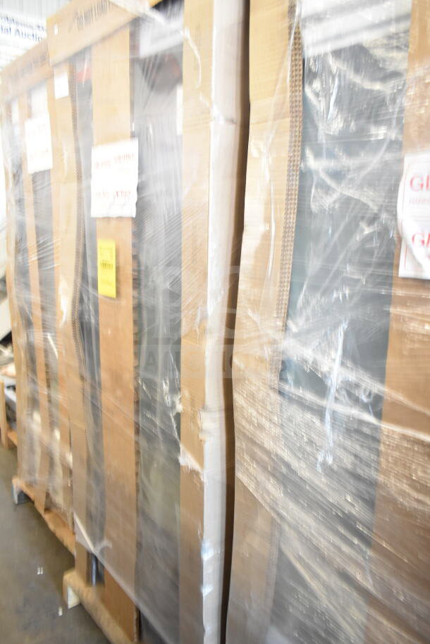 Auction item: Pallet of brand new scratch and dent items wrapped in plastic. Handwritten labels visible.