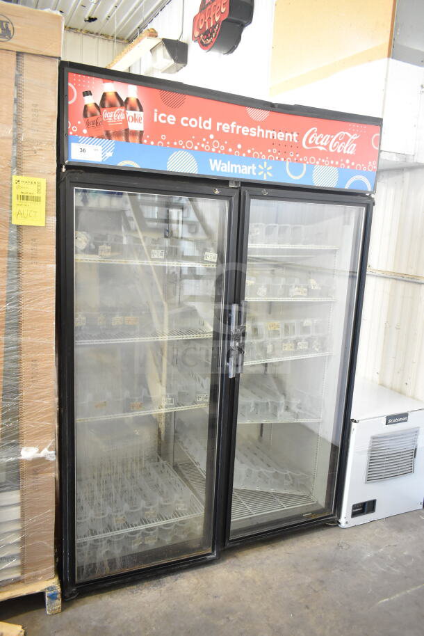 True GDM-52TM-RL-LD 2-Door Cooler Merchandiser with Coca-Cola branding, commercial use, 115 volts, 1 phase.