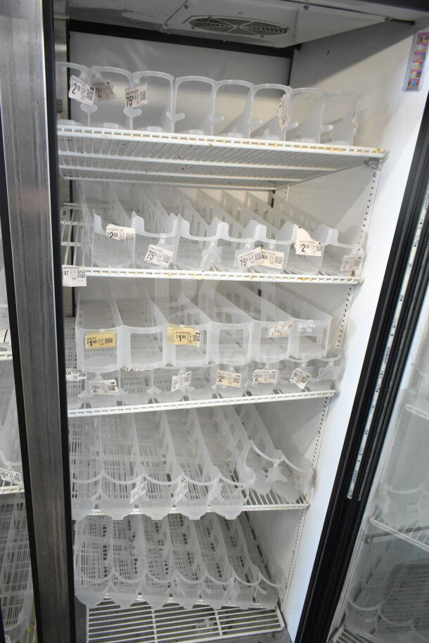 True GDM-52TM-RL-LD commercial cooler, 2-door, reach-in style, adjustable shelves, 115 volts, 1 phase, clean interior.