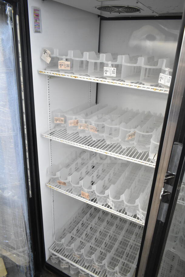True GDM-52TM-RL-LD commercial 2 door merchandiser cooler, 115V, 1 phase, white interior, shelves with dividers.