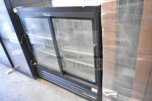 2024 True GDM-41SL-48-HC-LD Commercial 2 Door Reach-In Cooler, black finish, intact glass doors, 115 volts, 1 phase.