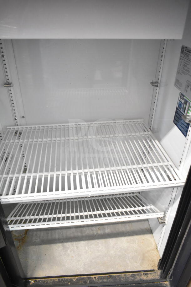 2024 True GDM-41SL-48-HC-LD commercial cooler, 2 door reach-in, clean interior, shelving, 115V, 1 phase, like new condition.