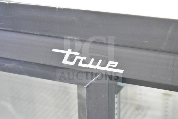 True GDM-41SL-48-HC-LD commercial reach-in cooler, black frame, logo visible, suitable for 115 volts, 1 phase.
