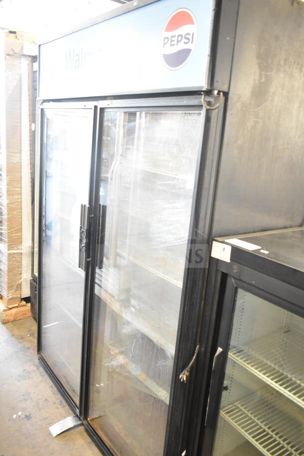 True GDM-52TM-RL-LD Commercial 2 Door Cooler with Pepsi branding, 115 Volts, used condition.