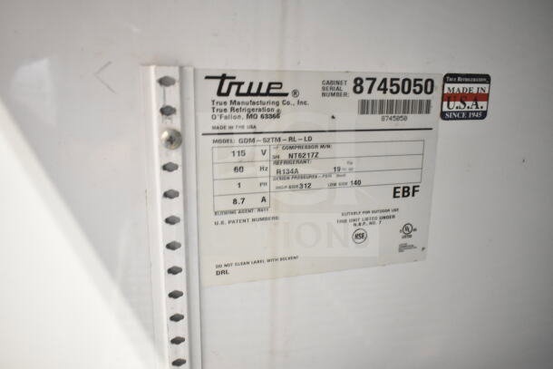 True GDM-52TM-RL-LD cooler label, 115V, 1 phase, model info and specs shown, NSF and UL listed, made in USA.