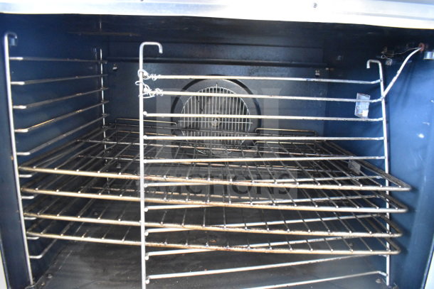 2020 Blodgett BDO-100-G-ES full-size convection oven interior, natural gas powered, with view-through doors and racks.