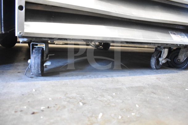 Avantco 178CFD1FF commercial freezer, single door, 115 volts, 1 phase, visible caster wheels, stainless steel.