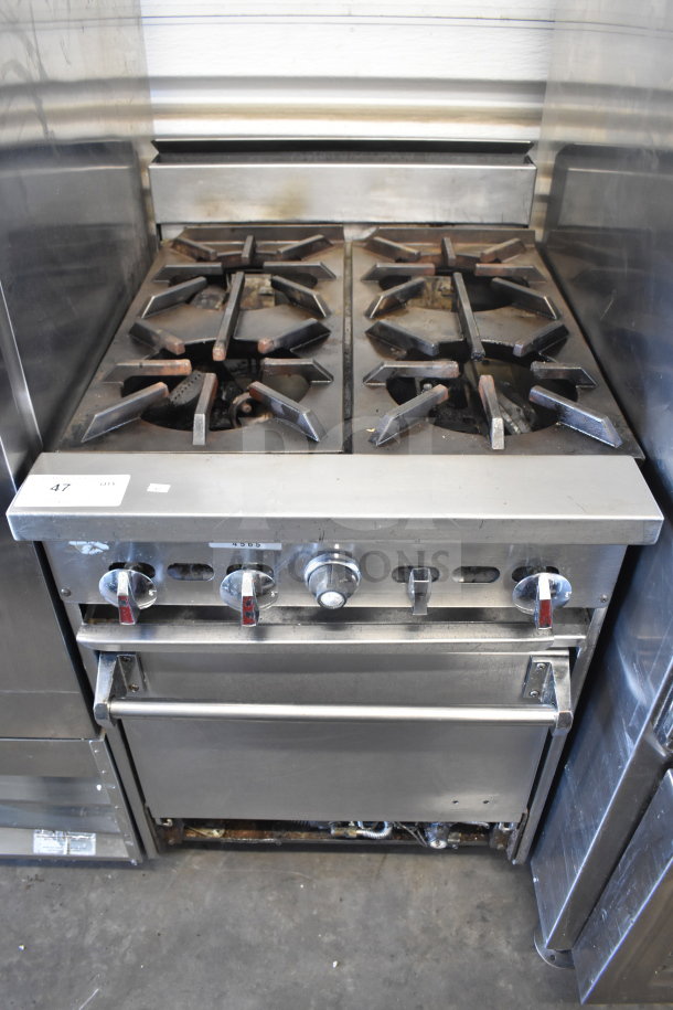 Commercial gas-powered 4 burner range with oven, stainless steel, used condition, visible control knobs, item tag "47".