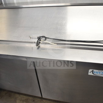 Avantco 178SSPT60MHC commercial sandwich salad prep table, stainless steel, 115 volts, excellent condition, visible Avantco logo.