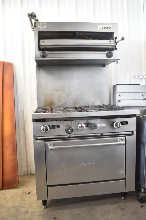 Garland SunFire commercial gas 6-burner range with salamander cheese melter, oven, and overshelf.